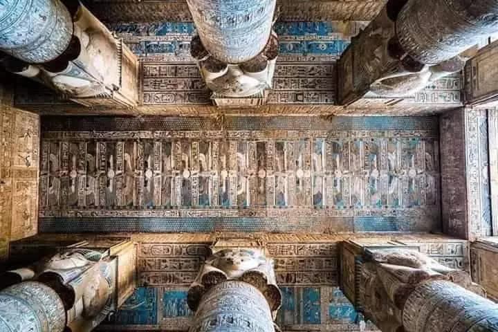The ornate painted ceiling and Hathor columns of the Temple of Hathor at Dendera