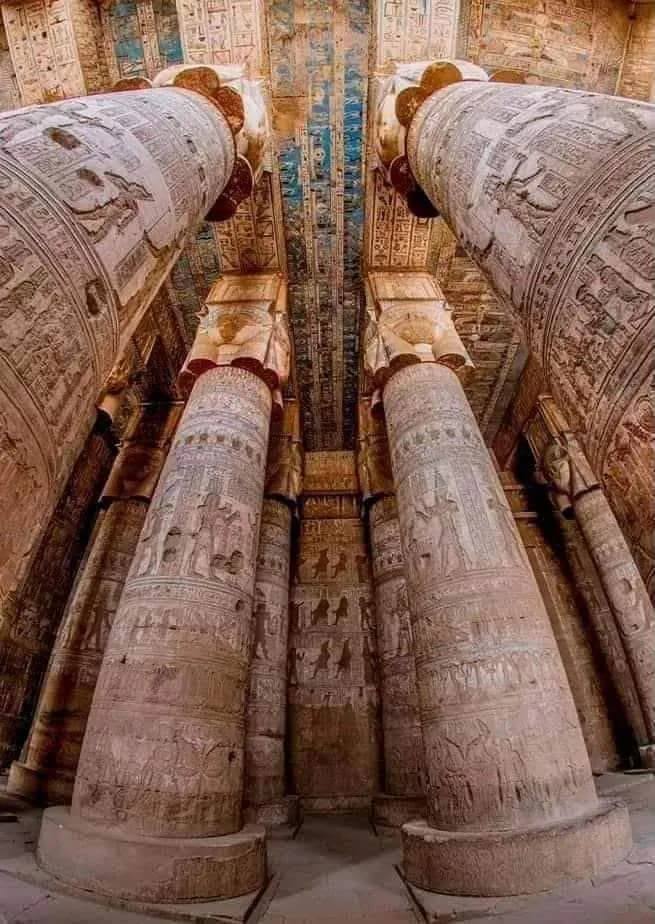 Towering Hathor-headed columns inside the Temple of Hathor at Dendera